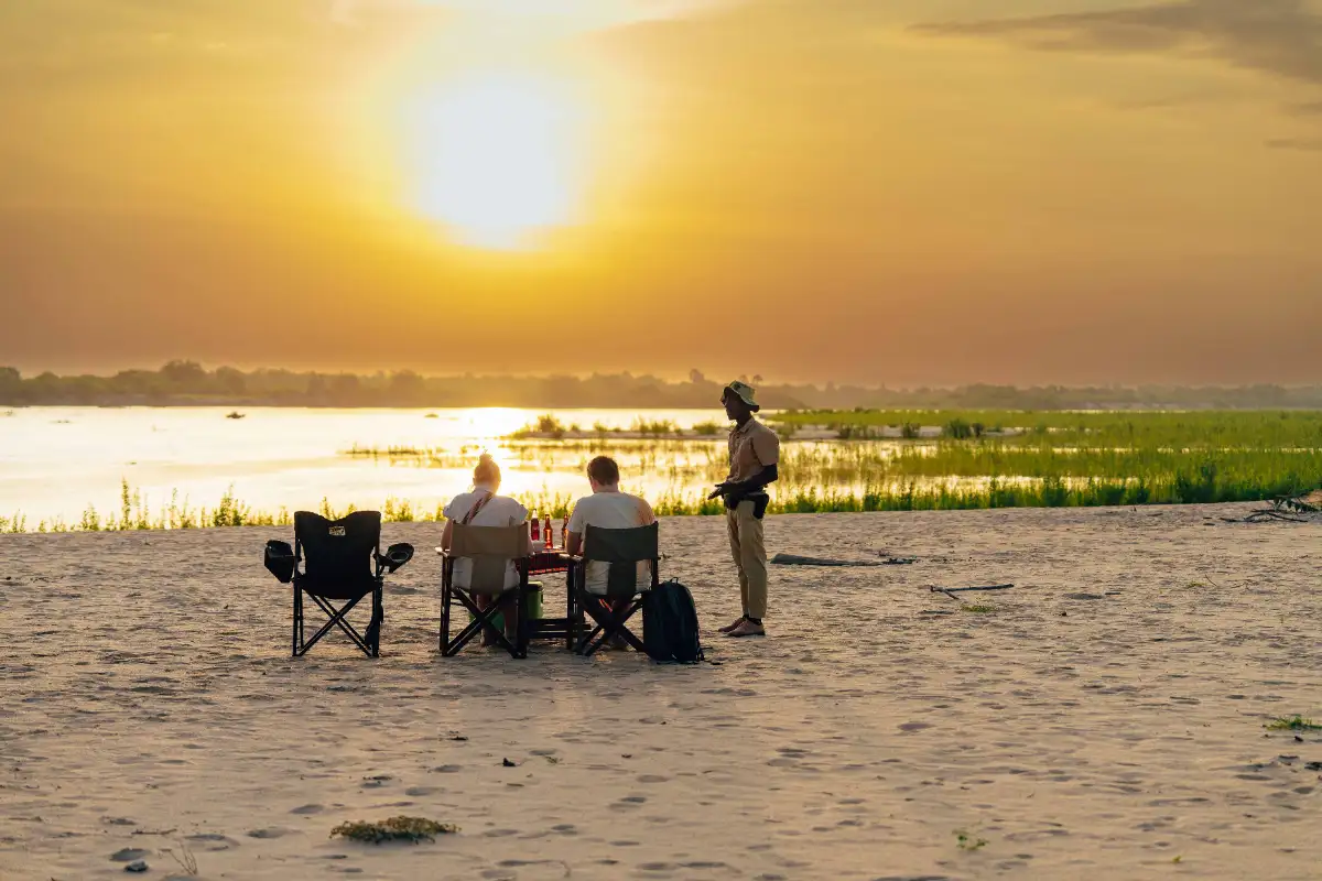 tourists watching the sunset in africa